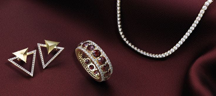 Elegant artificial jewellery with necklace, earrings and statement ring